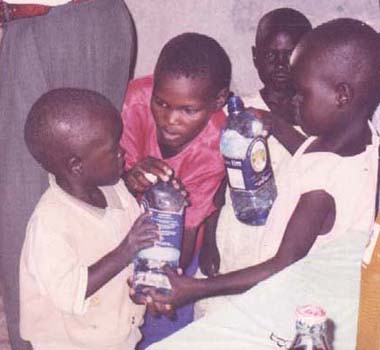 FKC children with bottled water, a rare treat